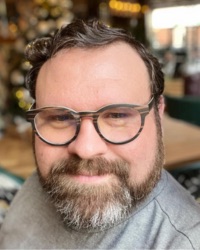 20250404_headshot_magee_john_002_200x250