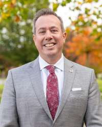 President MacKinnon Headshot 2 200x250